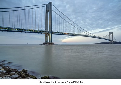 VerrazanoaÂ?Â?Narrows Bridge, in the U.S. state of New York, is a double-decked suspension bridge that connects the boroughs of Staten Island and Brooklyn in New York City at the Narrows