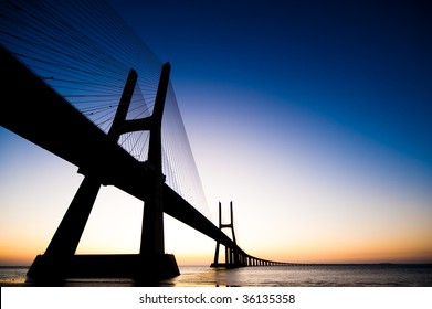 Bridge Vasco da Gama sunrise Lisbon Portugal - Powered by Shutterstock