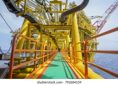 Bridge. Walkway. Transition From Central Processing Platform (CPP) To Well Head Platform Alpha (WHA) At Oil And Gas Platform.