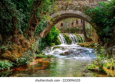 Bridge, waterfalls, river at the old town of Livadeia, in Boeotia region, Central Greece, Greece. - Shutterstock ID 2233096103