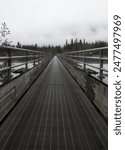 Bridge in Wrangell - St Elias National Park  leading to McCarthy on a foggy summer day in Alaska.