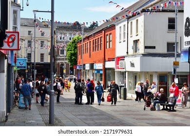 Bridgend, Bridgend County Borough, Wales UK: 6.2.2022:A View Along Caroline Street, One Of The Main Shopping Areas Of The Town.
