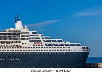 BRIDGETOWN, BARBADOS - December 2, 2017: RMS Queen Mary 2 Is The Largest Ocean Liner Ever Built, Having Served As The Flagship Of The Cunard Line Since Succeeding The Queen Elizabeth 2 In 2004.