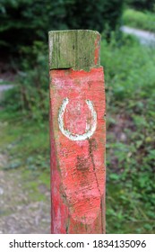 Bridle Path Horseshoe Symbol On A Wooden Post