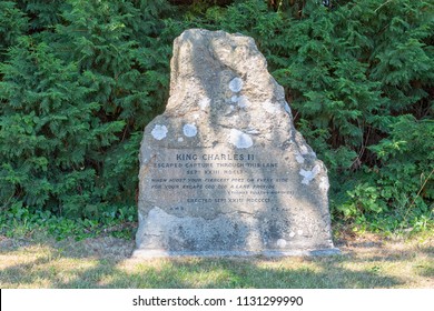 Bridport, Dorset, England - 7 July 2018: An Ancient Carved Stone Commemorating The Escape Of King Charles The Second The Second During The English Civil War. 