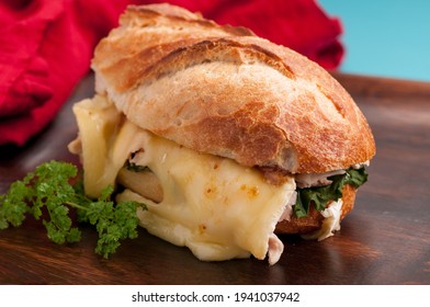 Brie Melted On Chicken On A Baguette Bread Roll