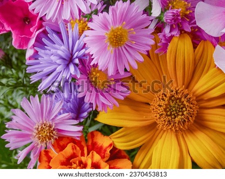 Bright beautiful bouquet of yellow white and red flowers, fragment, close. High quality photo     