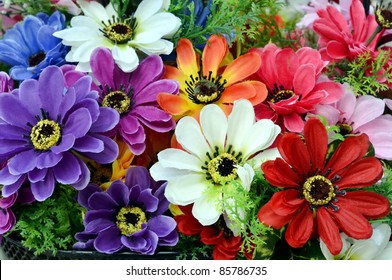 Bright and beautiful colors of plastic flowers.