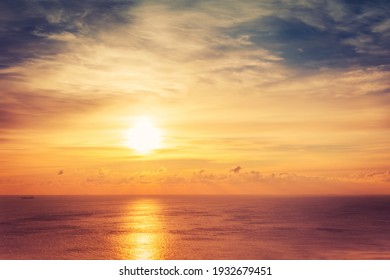 Bright beautiful sunrise or sunset at sea. - Shutterstock ID 1932679451