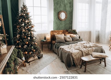 Bright bedroom with Christmas tree, cozy bed, large windows, and festive decorations. Green walls and wooden furniture enhance the airy, spacious feel - Powered by Shutterstock