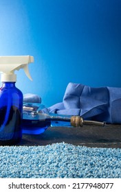 Bright Blue Background With Homemade, Environmentally Friendly Cleaning Supplies. 