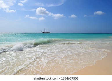 Bright Blue Caribbean Beach with Pirate Ship - Aruba