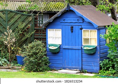 A Bright Blue Children's Den, In A Garden In Grays, Essex.