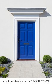 Bright blue english door and path