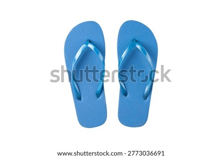 Bright blue flip flops placed on a surface for summer, PNG