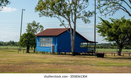 A Bright Blue Painted Club House For A Rural Pony Club Beside A Field Of Sugarcane