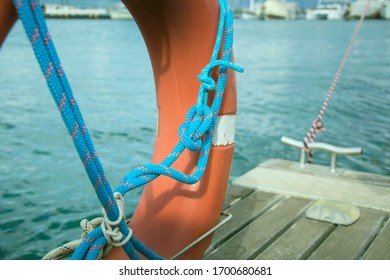 Bright Blue Rope With The Reef Knot On A Lifeline, Stay Safe In The Sea When Sailing