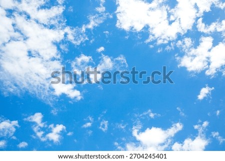 Bright Blue Sky with Clouds