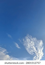 Bright blue sky at evening June,clear,soft cloud,breeze,scorching day.
