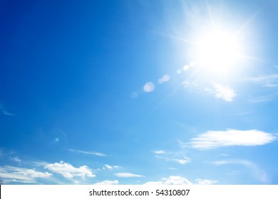 Bright Blue Sky With The Sun Causing Lens Flare