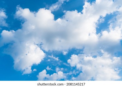 Bright Blue Sky With Thick White Clouds