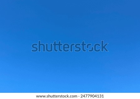 Bright blue summer cloudless sky on a sunny day, sky blue gradient, background, backdrop, desktop.