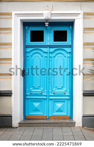 
Bright blue wooden vintage door