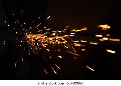Bright blue and yellow sparks on a black background. Magical lig - Shutterstock ID 639883897