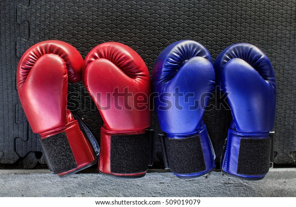 two pairs of boxing gloves