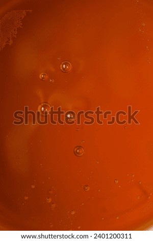 Bright brown thick sugaring paste or wax honey for procedure of hair removing in full screen