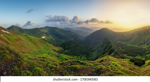 Bright Carpathian landscape in the morning light with beautiful green grass. Panoramic view. - Shutterstock ID 1700340583