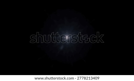 A bright, central light source against a black background, creating an abstract and conceptual image. The light appears to emanate from a single point.