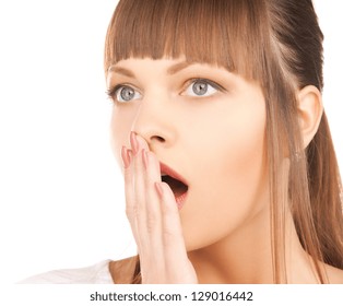 Bright Closeup Picture Of Woman With Hand Over Mouth.