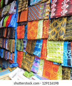 Bright cloth for sale at the market in Kumasi, Ghana