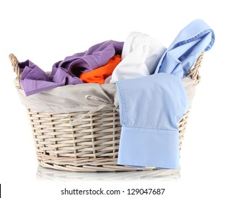 Bright Clothes In Laundry Basket, Isolated On White