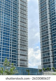 Bright clouds between two buildings