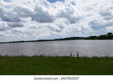Bright clouds over a lake