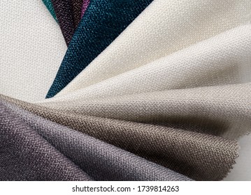 Bright collection of gunny textile samples. Multicolor Fabric texture background.
