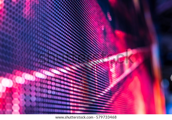 Bright colored LED\
video wall with high saturated pattern - close up background with\
shallow depth of field