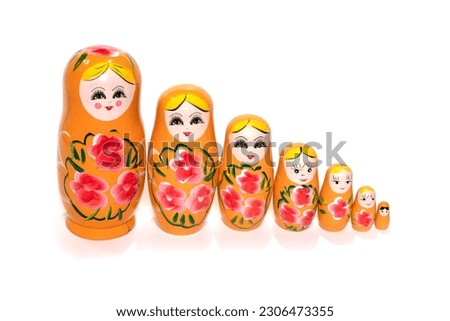 Bright colored nesting dolls on a white background. Russian national souvenir. Matryoshka. High quality photoBright colored nesting dolls on a white background. Russian national souvenir. Matryoshka.