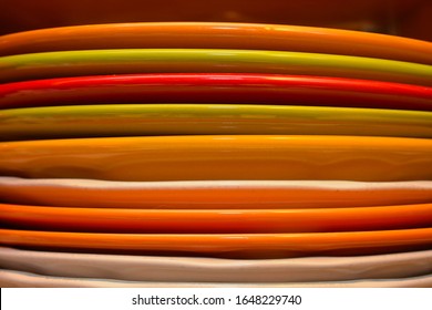 a bright colorful abstract close up of a stack of plates 