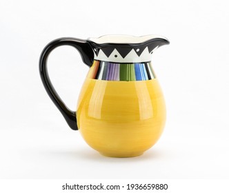 A Bright And Colorful Ceramic Water Pitcher.