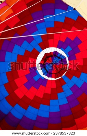 Bright Colorful Hot Air Balloon Dome, View From Inside. Abstract Background. Multicolored, Vertical Plane. Hot Air Expedition, Ride. Joyful, Spectacular Entertainment. High quality photo