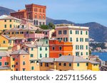 Bright colorful houses near seashore in Genoa, Italy. 