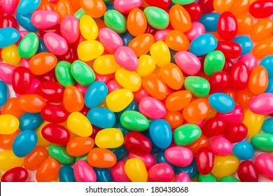 Bright, Colorful Jellybeans In Red, Green, Pink, Blue, Yellow And Orange Colors.