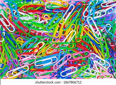 Bright colorful paper clips.top view.Background