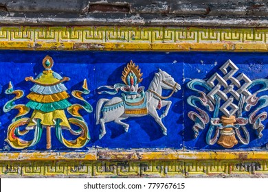 Bright Colorful Relief On The Stupa, A Symbol Of Tibetan Buddhism