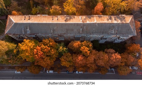 Bright Colourful Foliage On Aerial Top View On Autumn Fall Rusty Roof Of Living Building In Typical USSR Panel Apartment House 