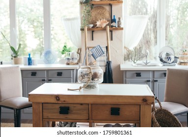 bright cozy decorated kitchen with windows, kitchen tools. photoshot area. Interior. 
nautical decor
