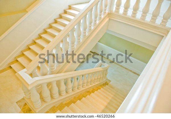 Bright Cream Colored Spiral Staircase Large Stock Image